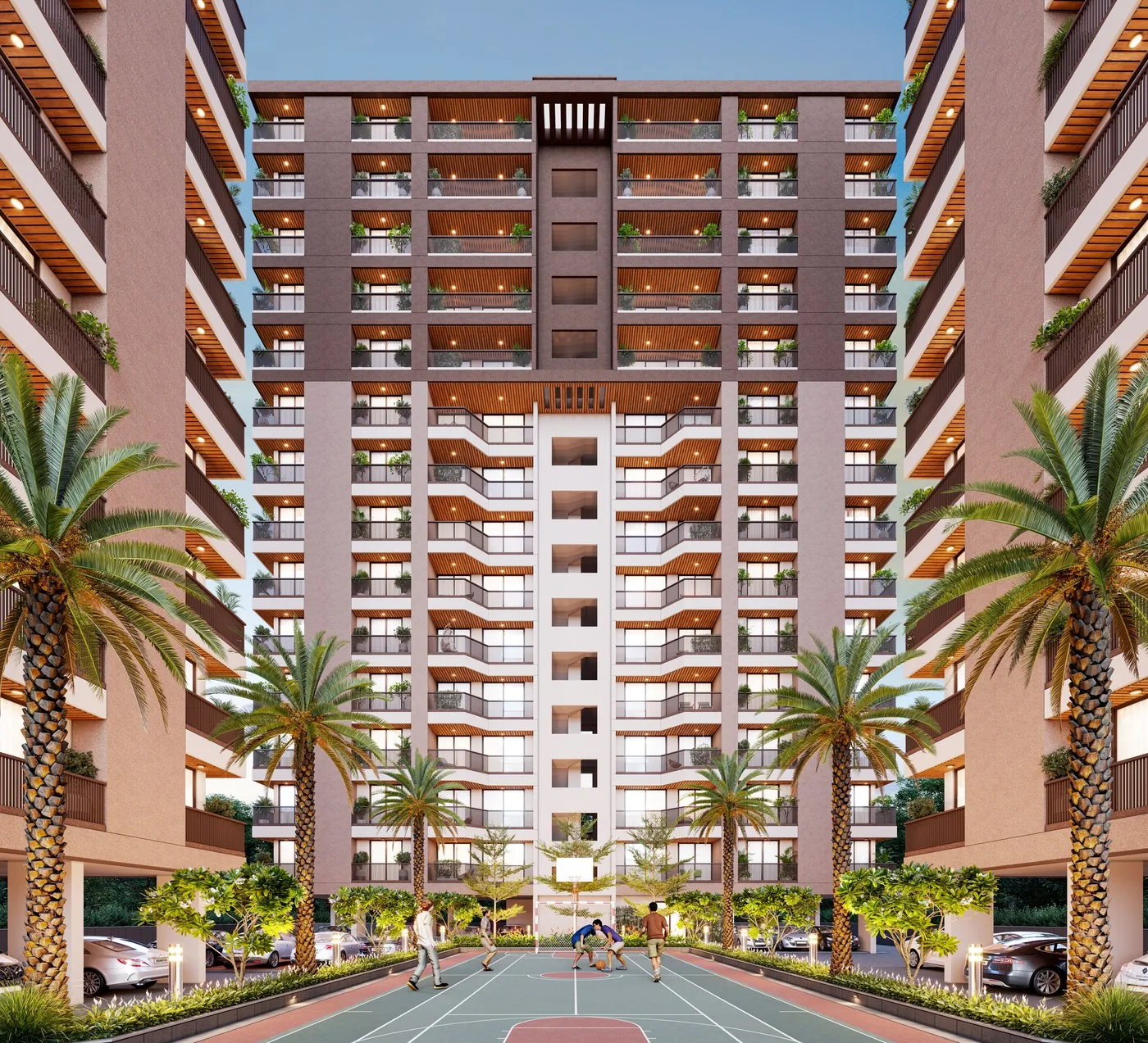 The courtyard elevation at dusk, balconies lit